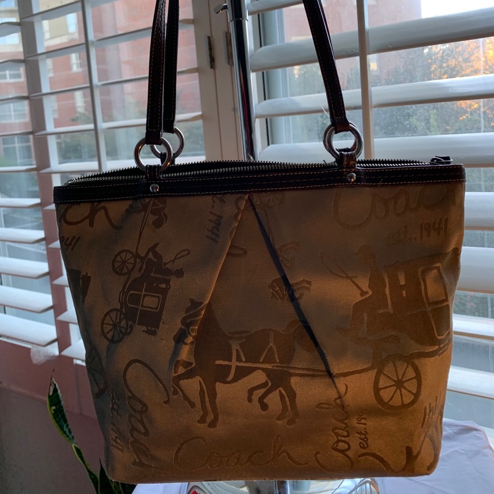 Pre loved Coach Stage Rider Monogram shoulder bag.